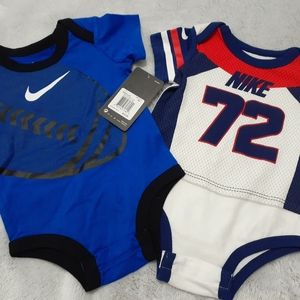Nike Onesies size 9 Months NWT!